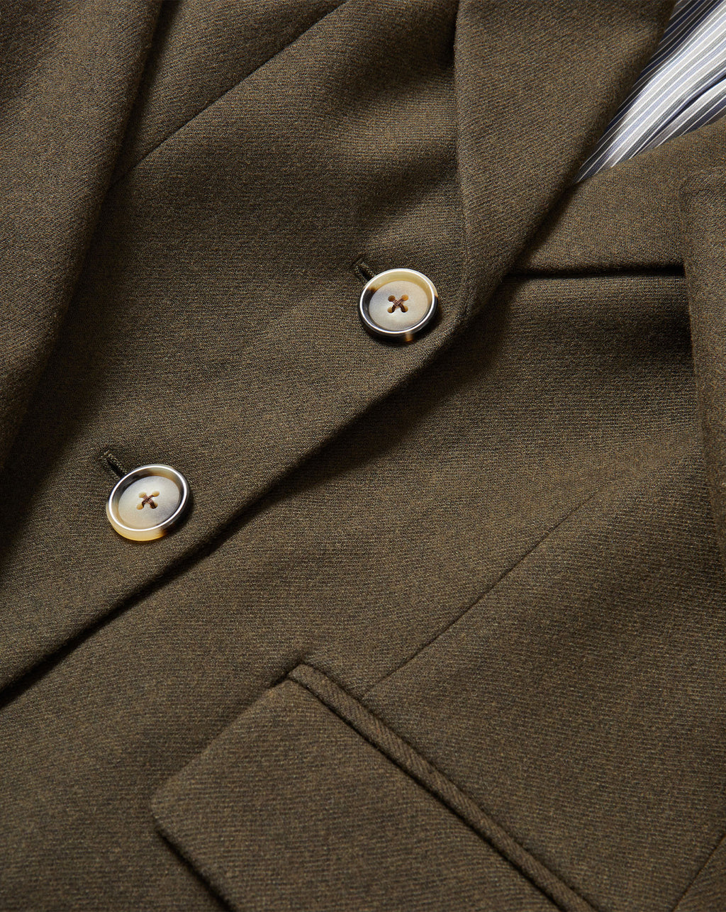 Veronica Beard Olive green tailored blazer with tortoiseshell buttons.