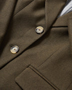 Veronica Beard Olive green tailored blazer with tortoiseshell buttons.