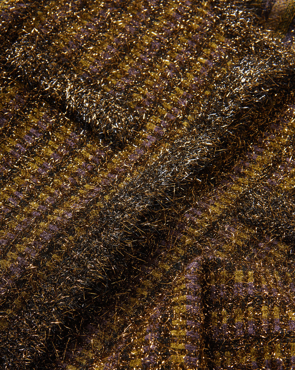 Veronica Beard Brown metallic tweed fabric texture with shimmering details.