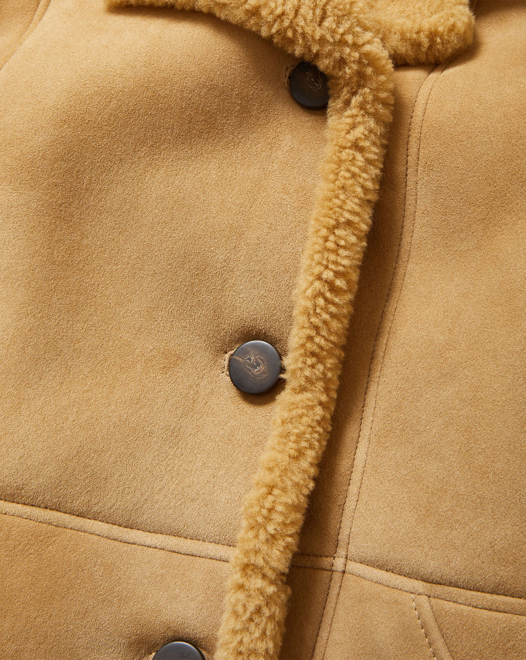 Veronica Beard Tan suede shearling coat with dark buttons.