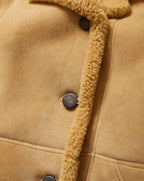 Veronica Beard Tan suede shearling coat with dark buttons.