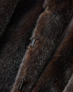 Veronica Beard Brown fur coat with metallic closure.