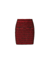 Veronica Beard Red tweed mini skirt with button pockets.