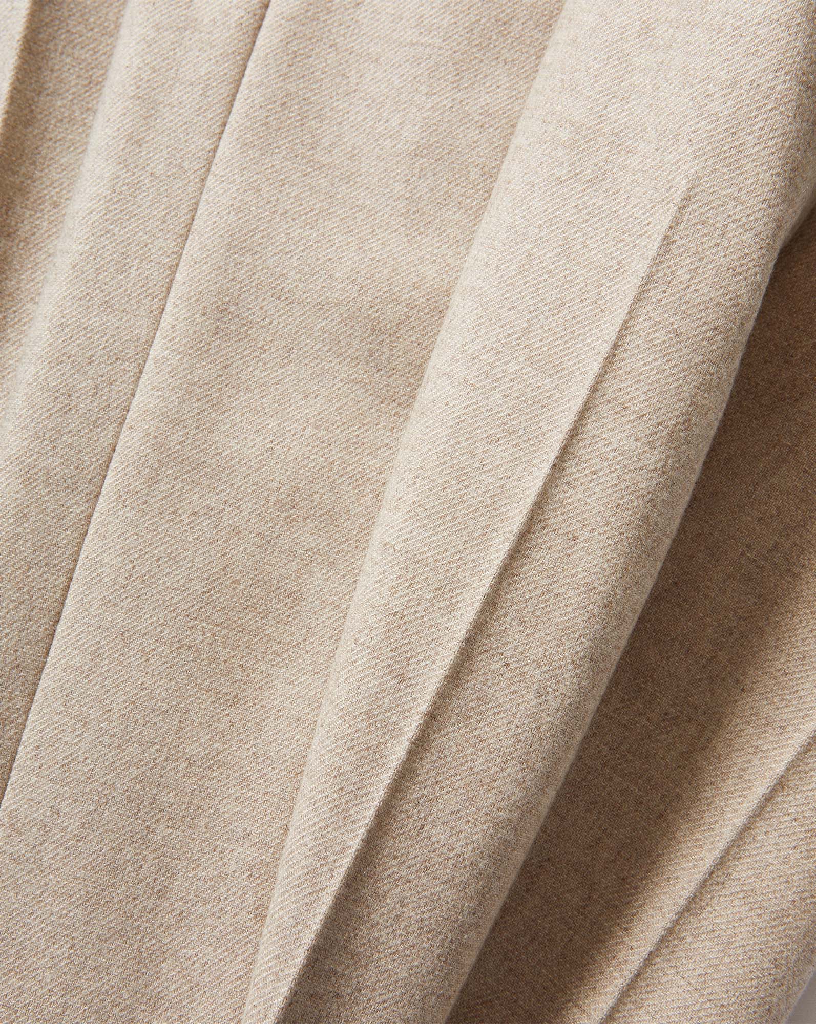 Veronica Beard Beige wool pleated trousers with sharp creases.