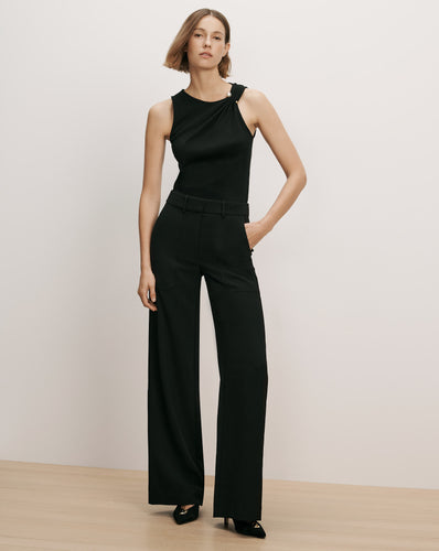 Veronica Beard Black asymmetric draped sleeveless top and trousers.