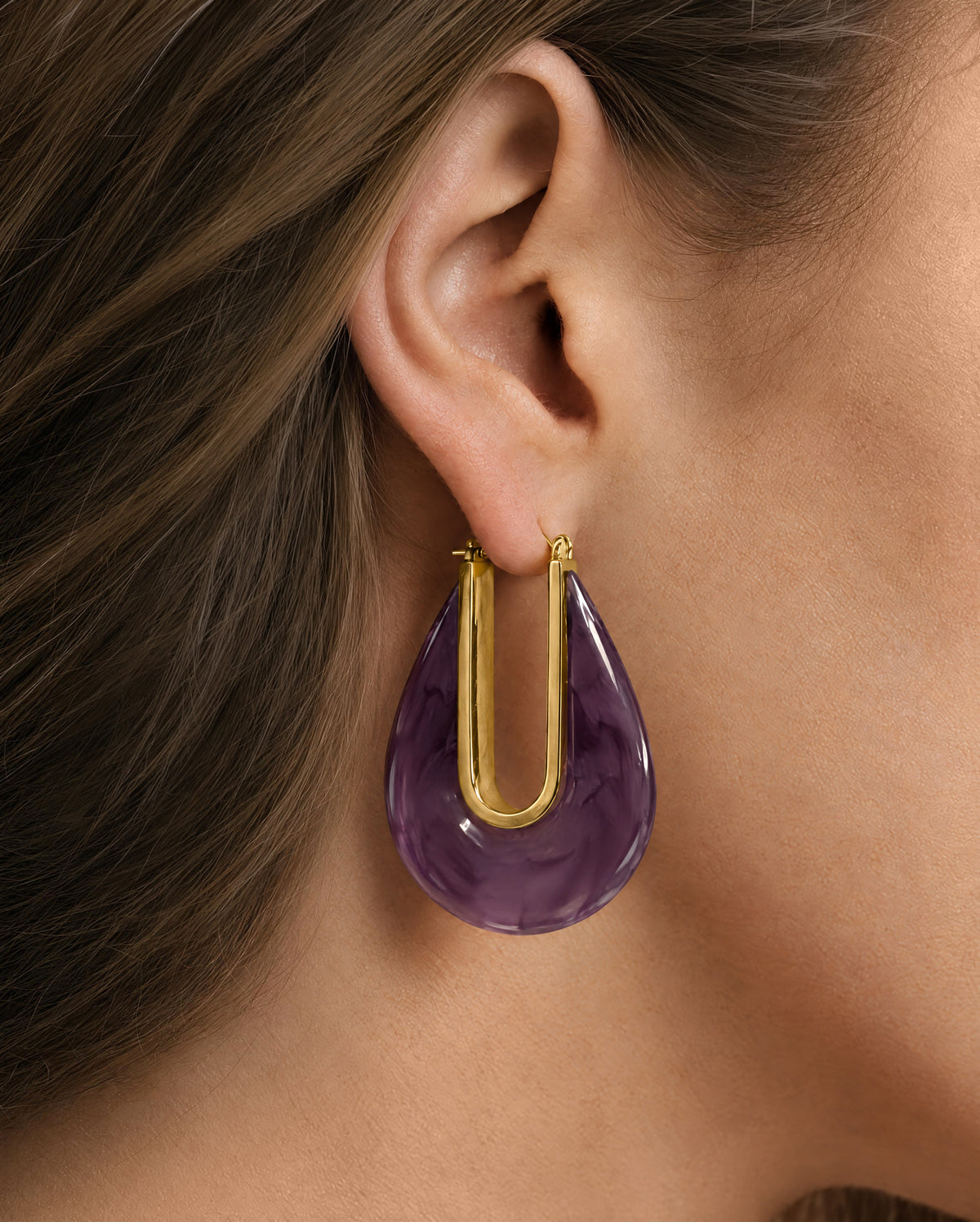 Veronica Beard Gold and purple resin teardrop hoop earrings.