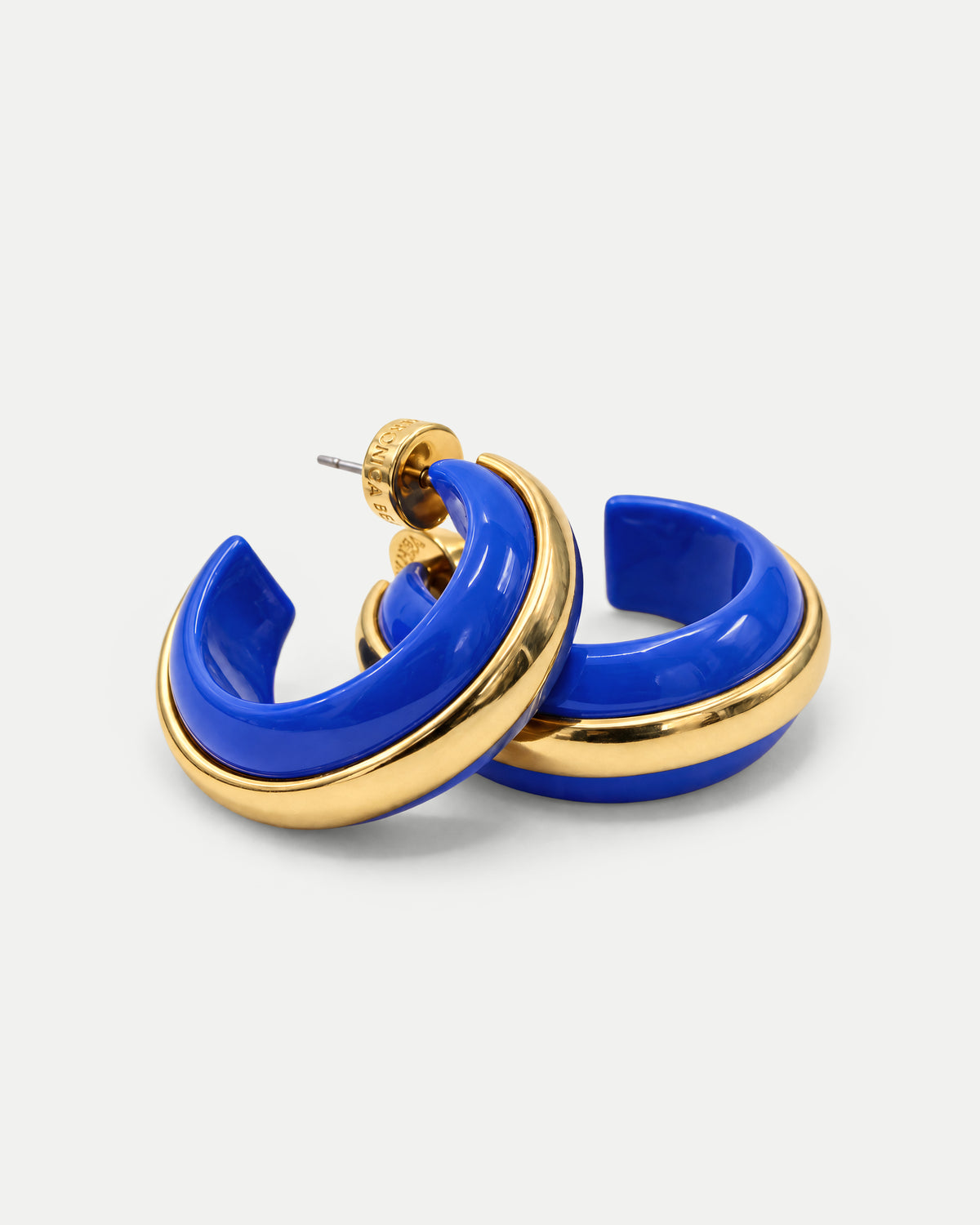 Veronica Beard Blue and gold chunky hoop earrings.