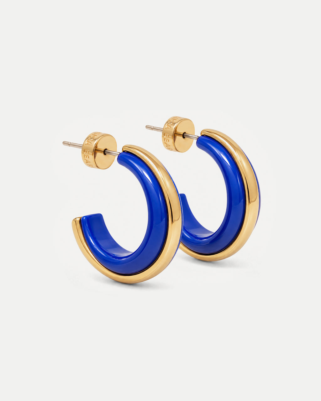 Veronica Beard Blue and gold enamel hoop earrings.
