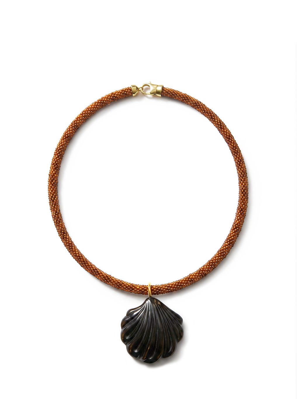 Veronica Beard Brown beaded necklace with a dark shell pendant.