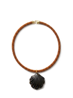 Veronica Beard Brown beaded necklace with a dark shell pendant.