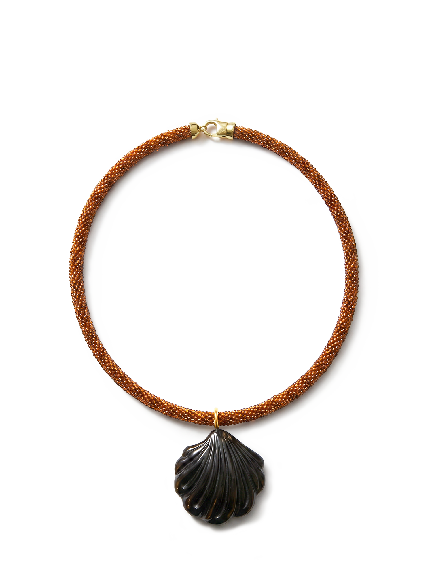 Veronica Beard Brown beaded necklace with a dark shell pendant.