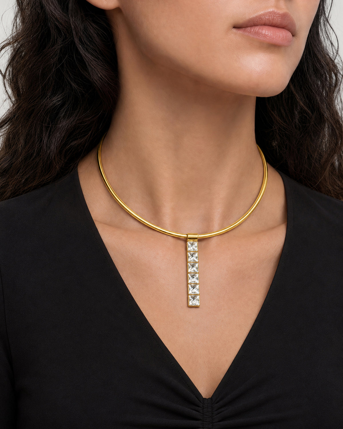 Veronica Beard Gold necklace with square crystal drop pendant.