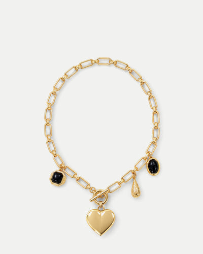 Veronica Beard Gold chain necklace with black charm pendants.