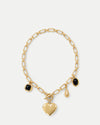 Veronica Beard Gold chain necklace with black charm pendants.