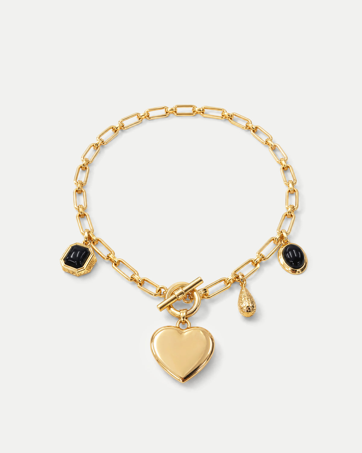 Veronica Beard Gold chain bracelet with heart and gemstone charms.
