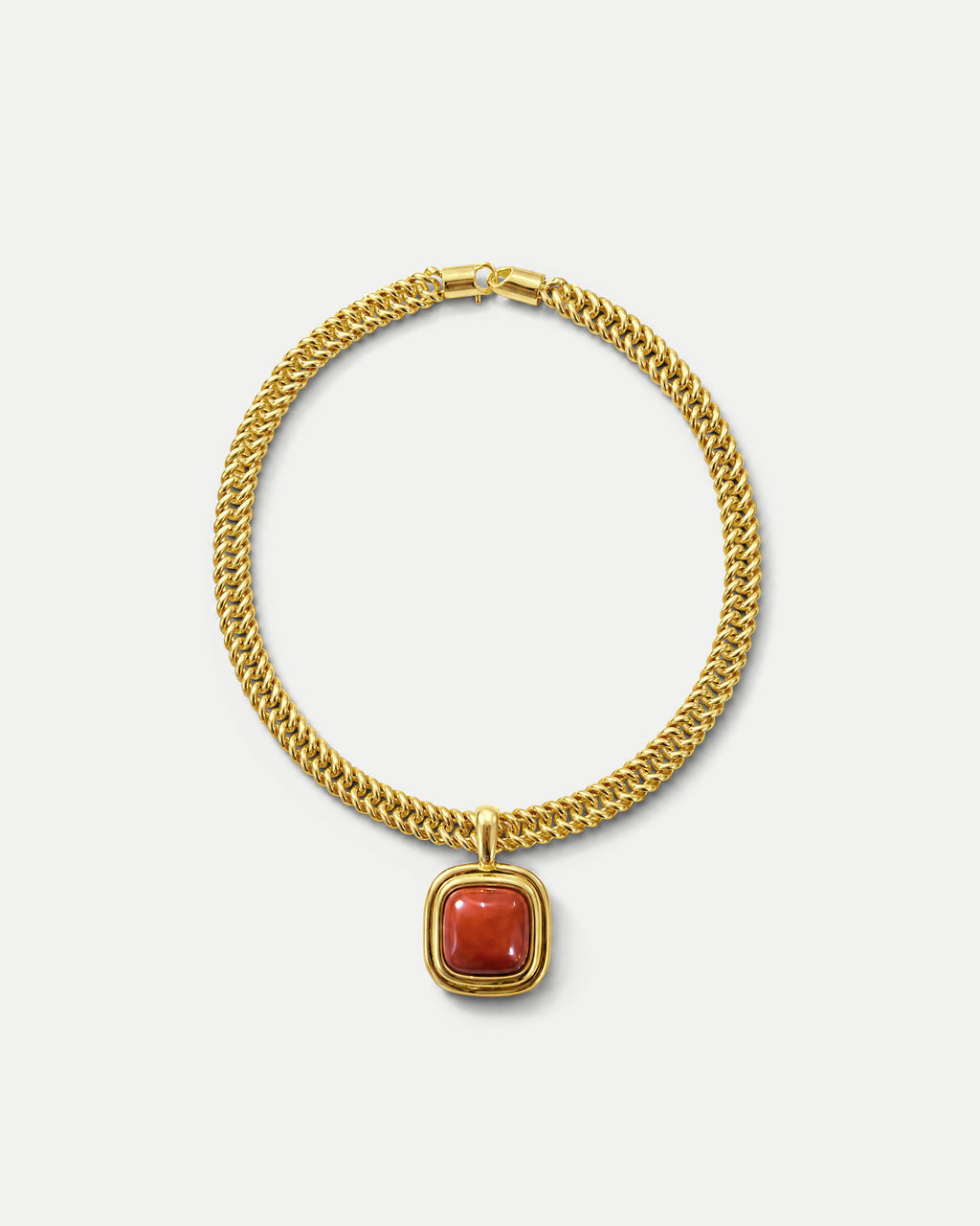 Veronica Beard Gold chain necklace with red stone pendant.