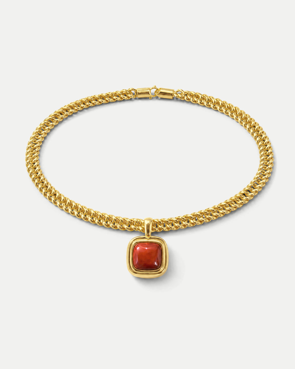Veronica Beard Gold chain necklace with a square red gemstone pendant.