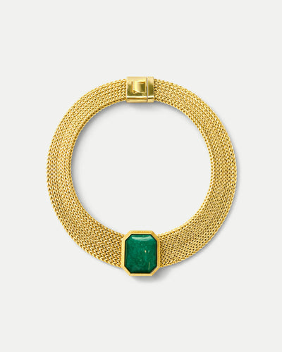 Veronica Beard Gold mesh necklace with green gemstone pendant.