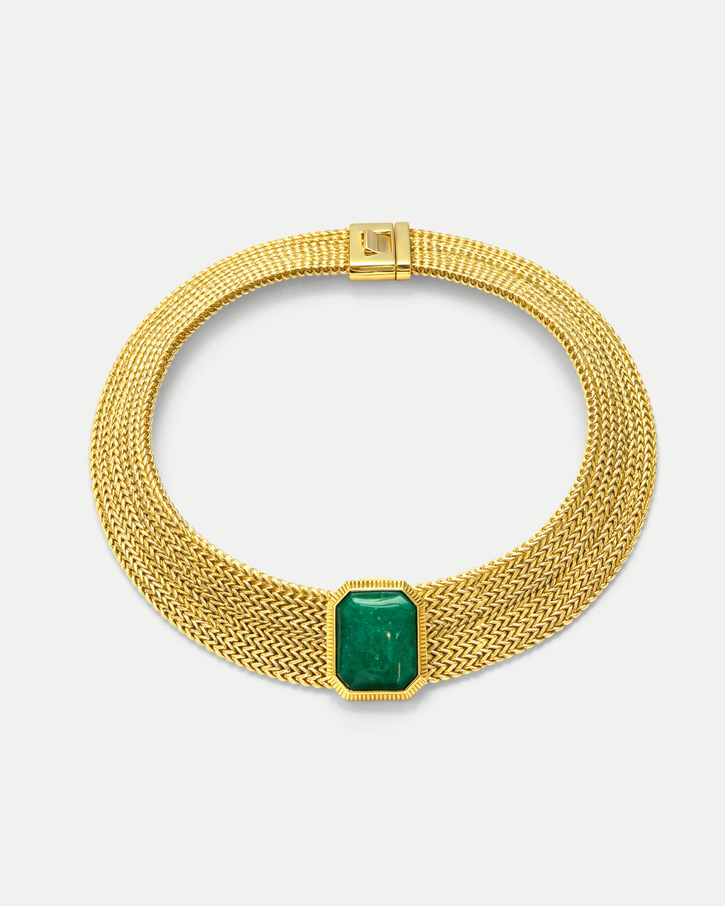 Veronica Beard Gold mesh choker with emerald gemstone pendant.