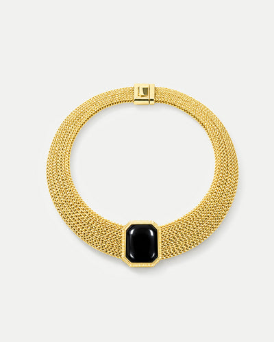 Veronica Beard Gold mesh necklace with black gemstone pendant.