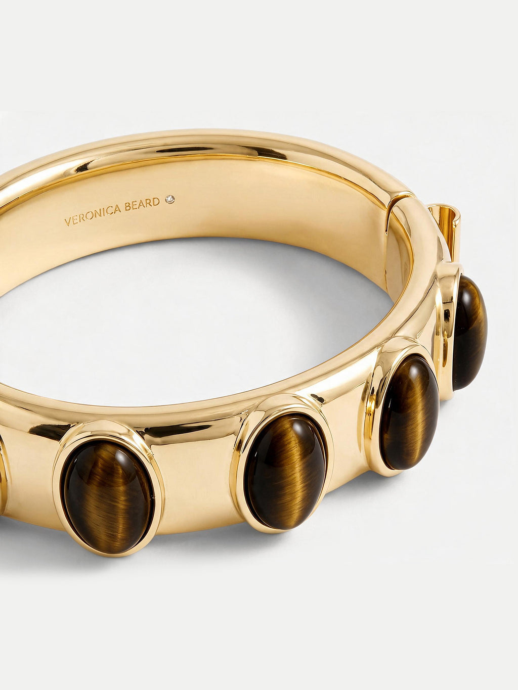 Veronica Beard Gold cuff bracelet with tiger-eye stones.