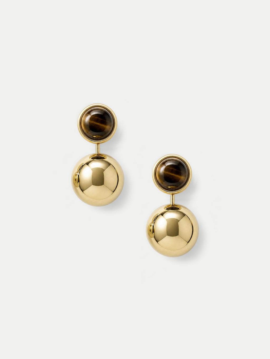 Veronica Beard Gold drop earrings with tiger's eye cabochons.