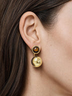 Veronica Beard Gold drop earrings with brown tiger's eye stones.