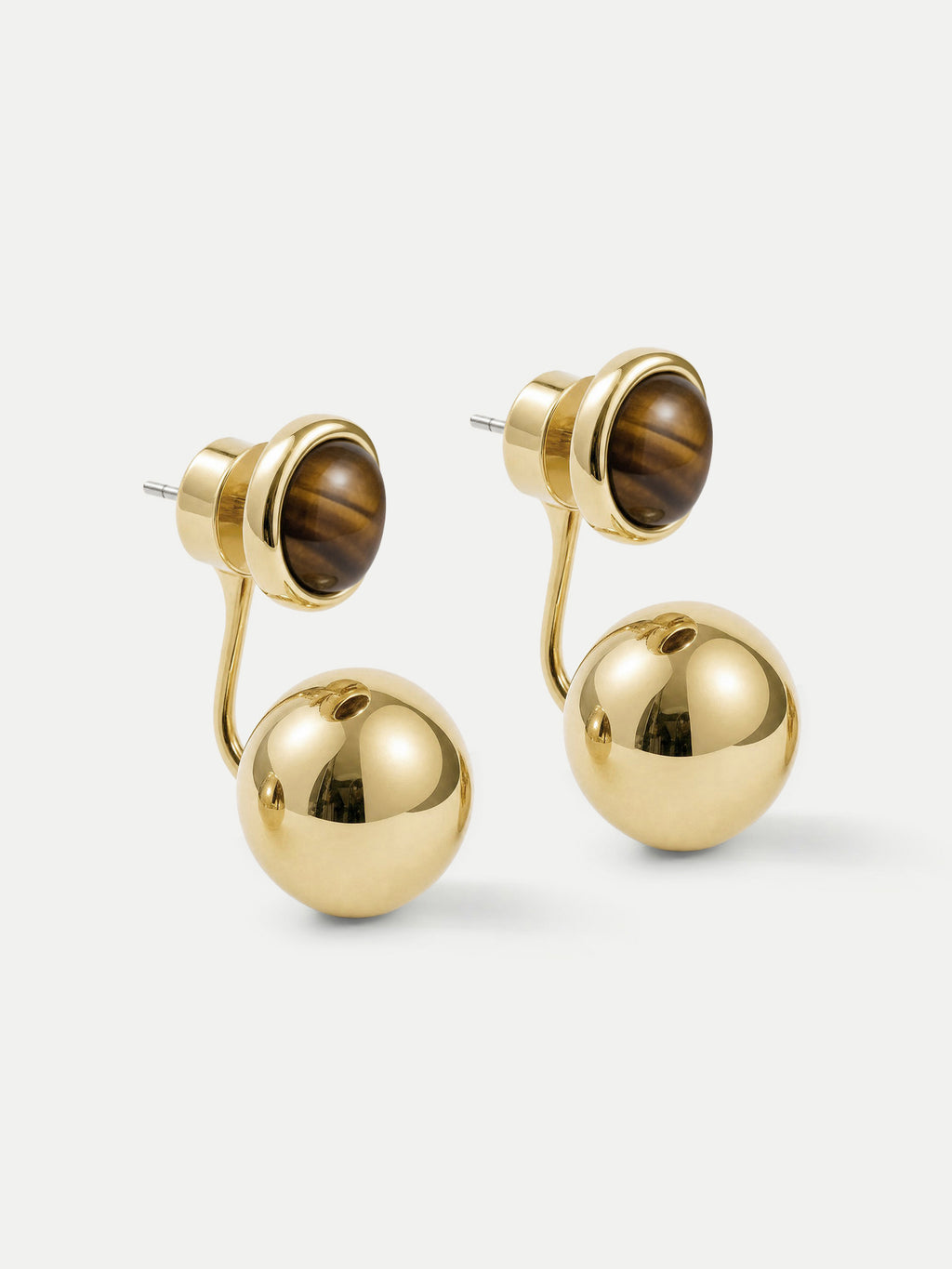 Veronica Beard Gold double-sided ball earrings with brown stones.