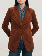 Veronica Beard Brown corduroy blazer with denim shirt and bolo tie.