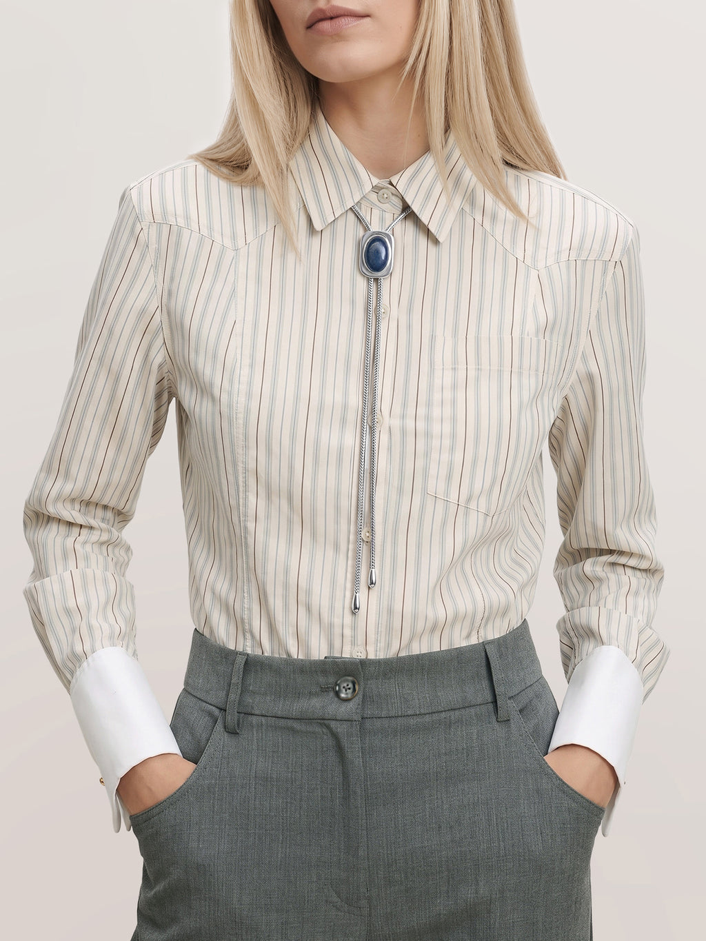Veronica Beard Beige striped button-up shirt with white cuffs.