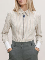 Veronica Beard Beige striped button-up shirt with white cuffs.