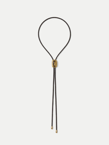 Veronica Beard Black braided leather bolo tie with gold hardware.