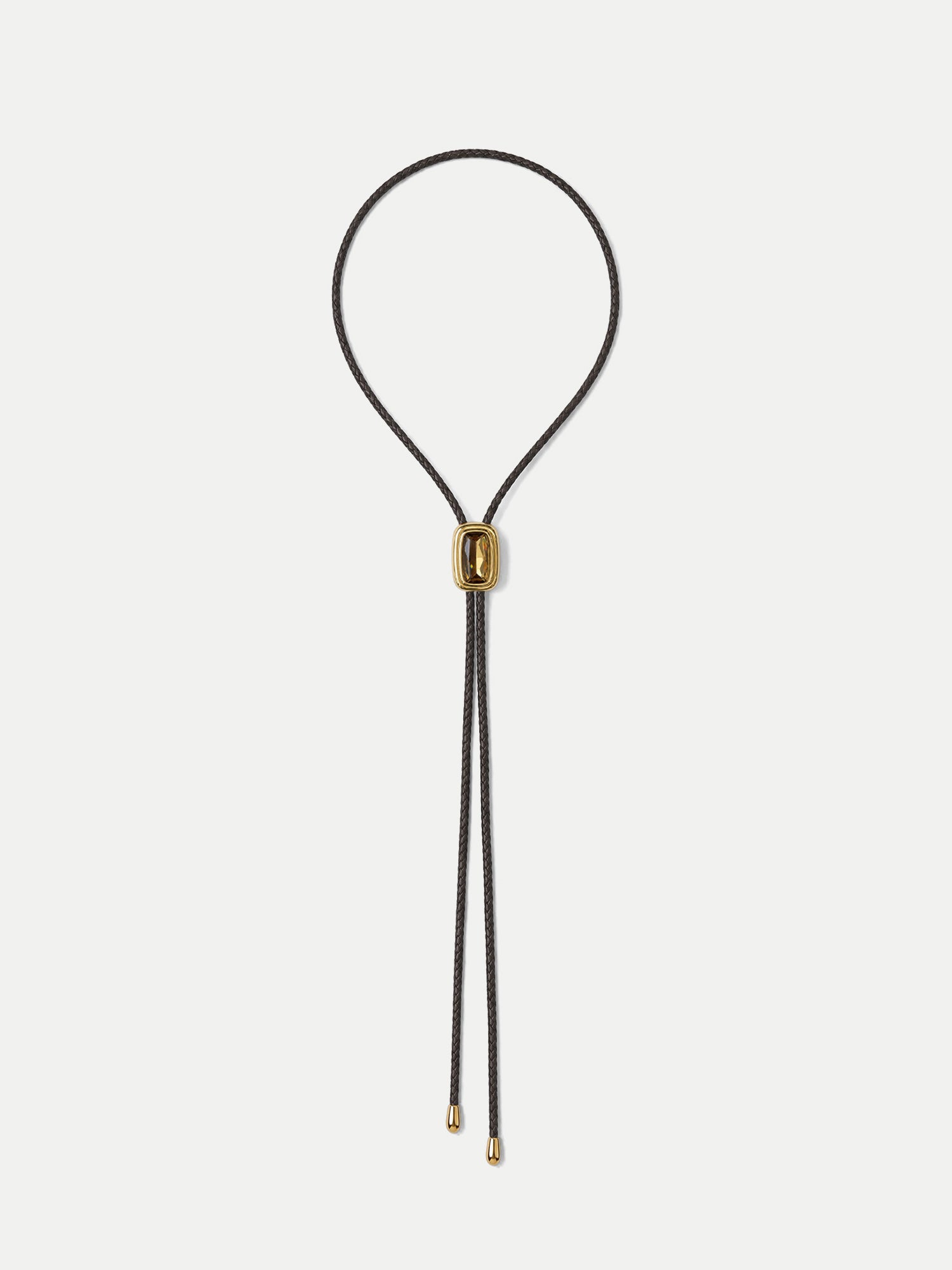 Veronica Beard Black braided leather bolo tie with gold hardware.