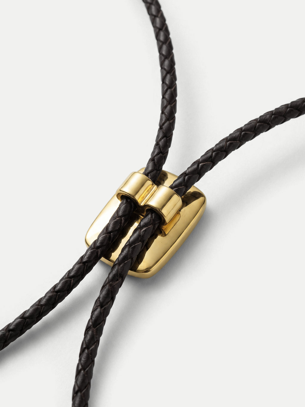 Veronica Beard Black braided leather cord with gold-tone slider.