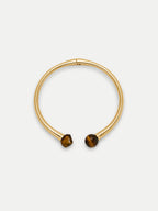 Veronica Beard Gold bangle bracelet with brown tiger's eye stones.