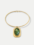 Veronica Beard Gold choker necklace with green stone pendant.