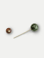 Veronica Beard Green stone and gold hat pin.