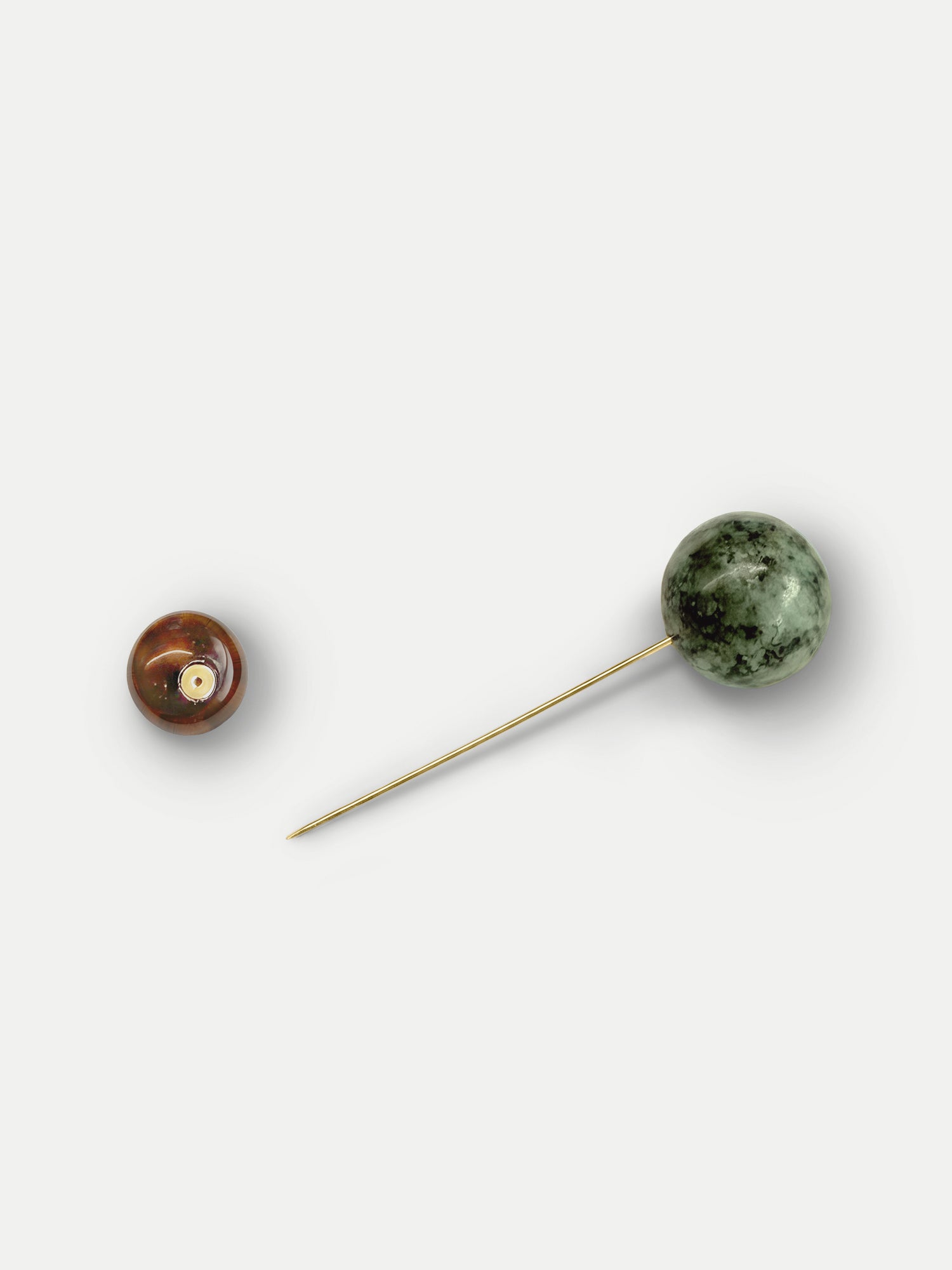 Veronica Beard Green stone and gold hat pin.