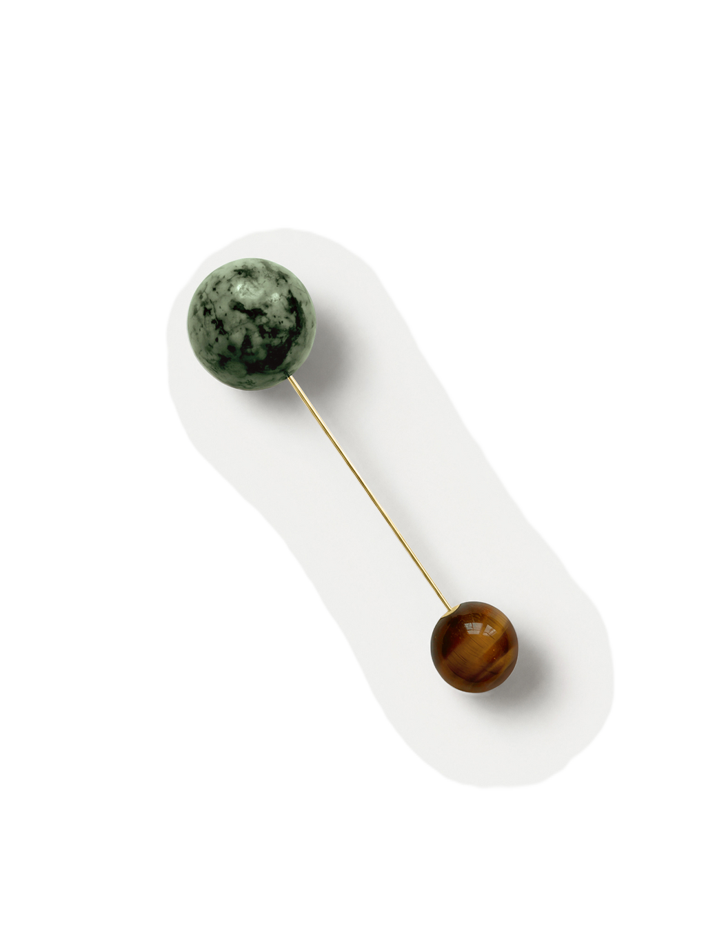 Veronica Beard Gold pin with green and brown stone spheres.