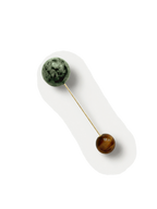Veronica Beard Gold pin with green and brown stone spheres.