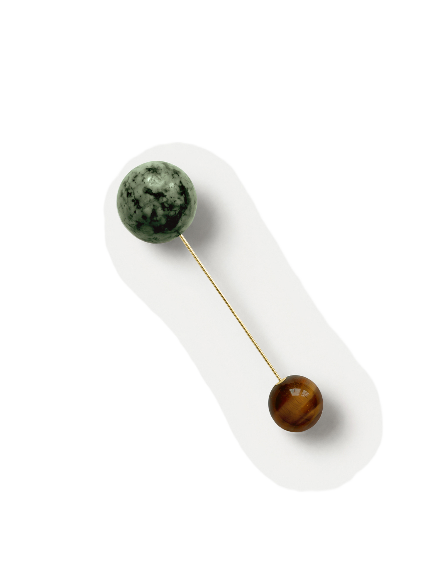 Veronica Beard Gold pin with green and brown stone spheres.