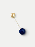 Veronica Beard Gold and blue lapis lazuli bead pin.