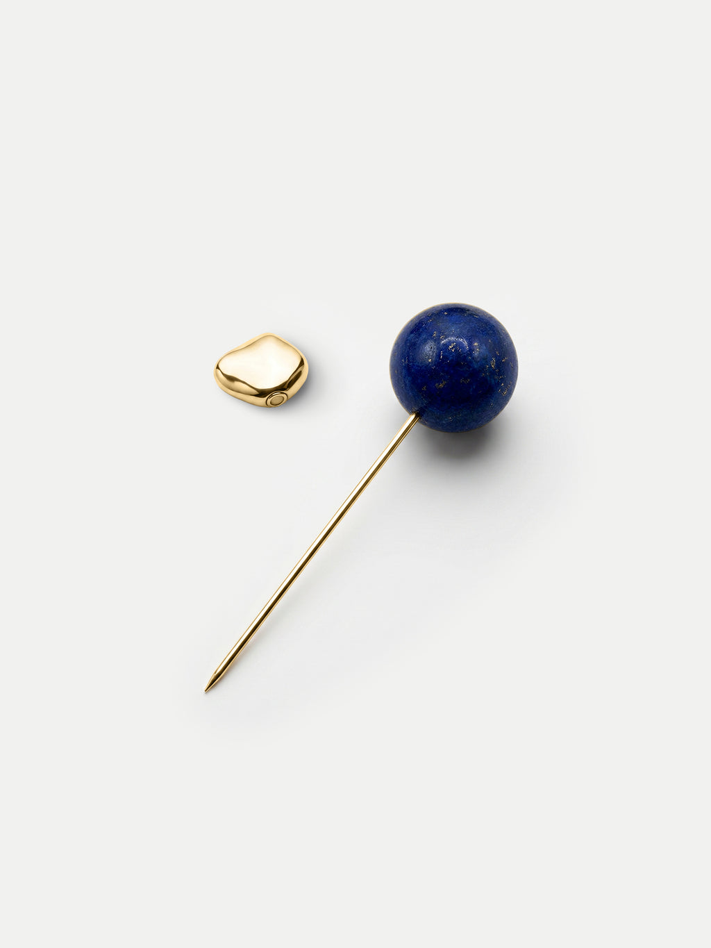Veronica Beard Gold lapel pin with blue lapis lazuli sphere.