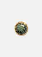 Veronica Beard Round green stone gold ring with beaded edge.