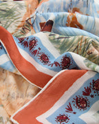 Veronica Beard Multicolor patterned scarf with blue, orange, and white stripes.