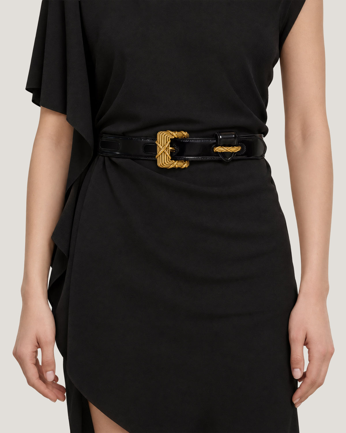 Veronica Beard Glossy black belt with large woven gold buckle.