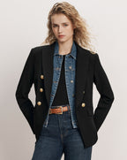 Veronica Beard Black double-breasted blazer with gold buttons and denim jacket insert.