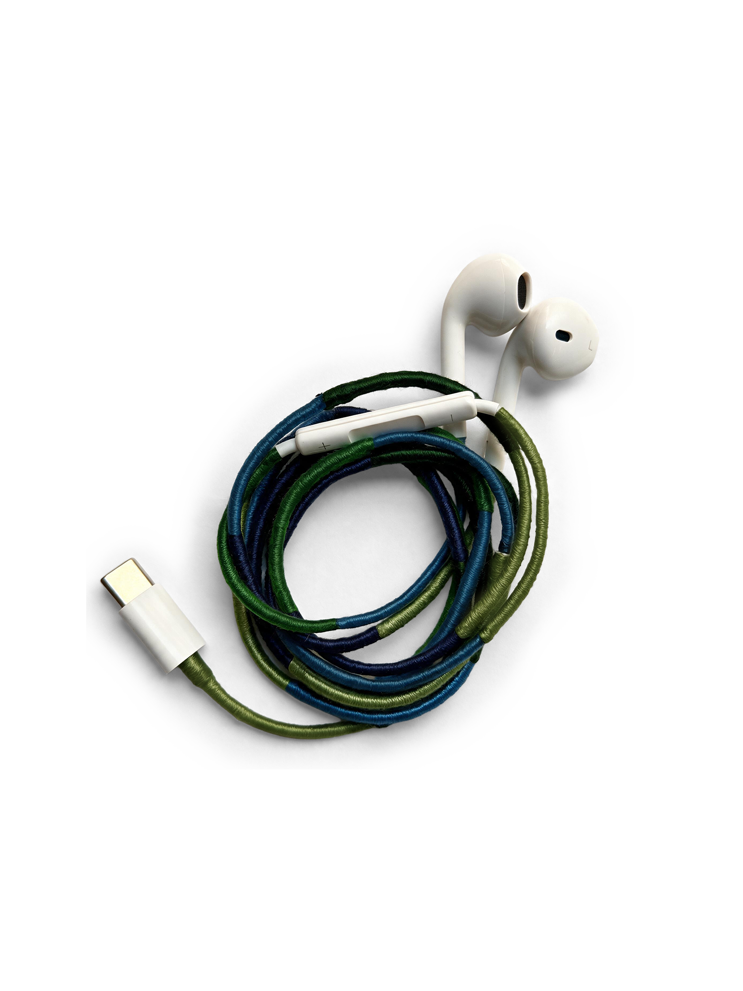 Veronica Beard White earbuds with a braided blue and green cord.