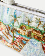 Veronica Beard Beaded clutch with a colorful beach scene and palm trees.