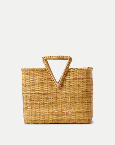 Veronica Beard Natural woven straw tote bag with a triangular top handle.